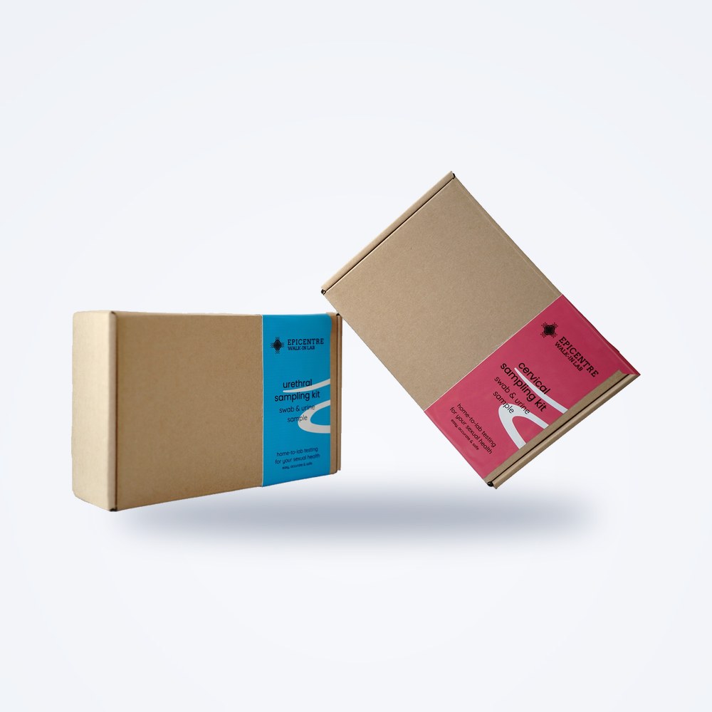 The two Epicentre home sampling kits side by side: a brown box with a pink label and one with a blue label