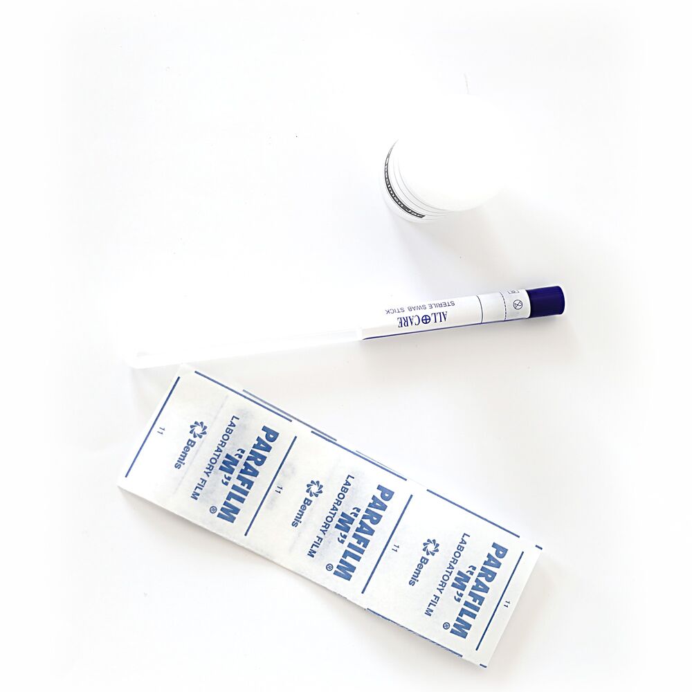 A sterile swab, a urine jar and a parafilm seal strip from an Epicentre kit